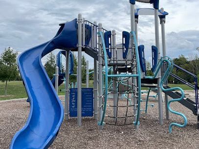 Blue slide and playground structure in Yongehurst, Richmond Hill, Ontario