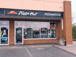 Outside sign of pizza restaurant in Headford, Richmond Hill, Ontario