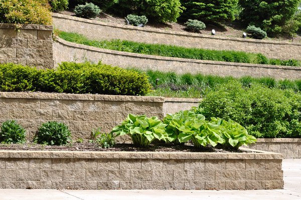 multilevel retaining wall with greenery at each step